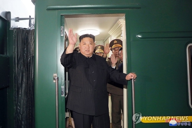 kim jong un is getting off the train